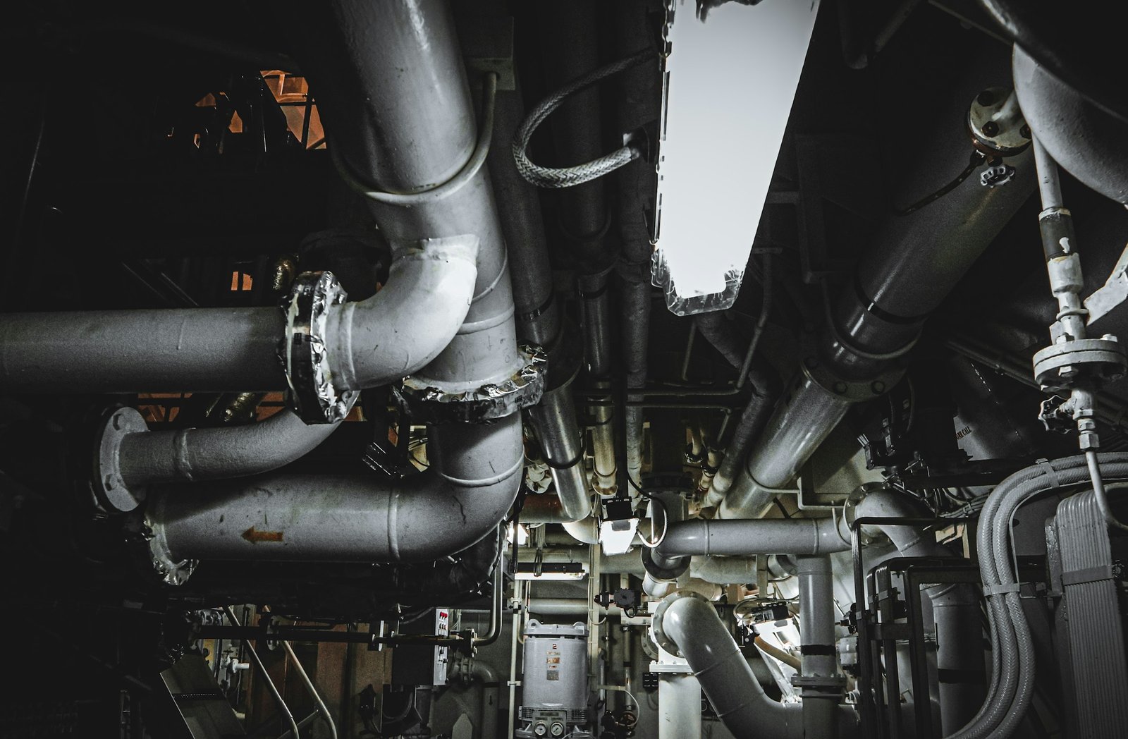 Plumbing and drainage pipework in a services area